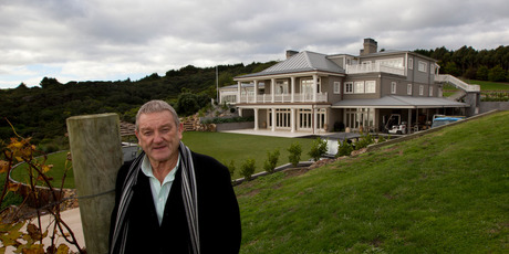 Agent Clive Lonergan says the property, which has a wine cellar and a heated pool with a drop-down screen, is "one of the best houses in Auckland, if not the best". Photo / Brett Phibbs