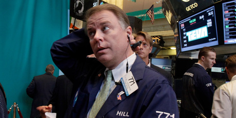 Trader F. Hill Creekmore works on the floor of the New York Stock Exchange. Stocks fell sharply on Friday after the release of a dismal report on job creation in the US.
Photo / AP