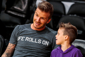 David Beckham with his son, Cruz.
Photo / AP