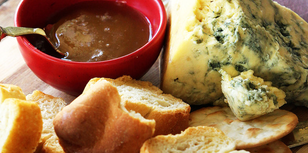 Strong-flavoured blue cheese goes well with honey. Photo / Doug Sherring