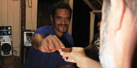 Drinking the special homebrew with the locals at a tumunu on Atiu island. Photo / Jim Eagles