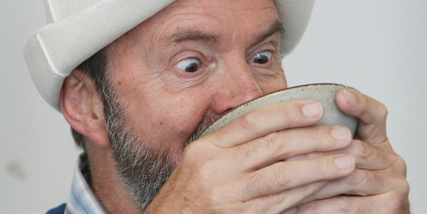 Jim Eagles samples some kumyz (fermented mare's milk) - a favourite of Kyrgyz nomads. Photo / Greg Bowker
