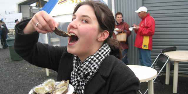 Eveline Jenkin samples the stars of the show at Bluff's world-famous-in-NZ Oyster and Food Festival. Photo / Eveline Jenkin