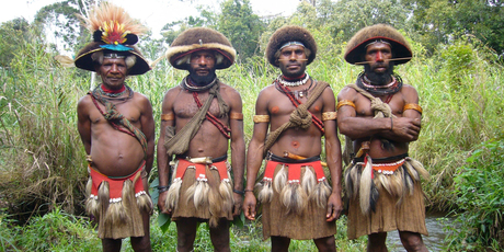 Wigman Kevin (left) and his assistants. The one second from the right is growing his hair to be made into a wig such as the others are wearing. Photo / Jim Eagles