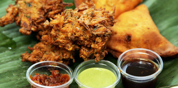 Onion bhajis and vegetarian samosas with tamarind chutney, carrot chutney and mint and yoghurt chutney. Photo / Hawke's Bay Today