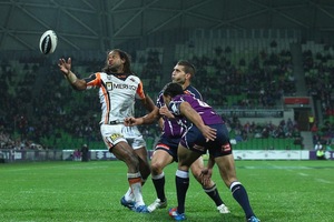 Lote Tuqiri of the Tigers looks to control the ball. Photo / Getty Images