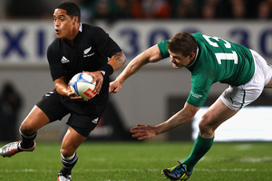 Aaron Smith of the All Blacks breaks through the tackle of Brian O'Driscoll of Ireland during the International Test Match between the New Zealand All Blacks and Ireland. Photo / Getty Images.