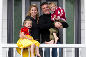Kara Moeller-Laird and Gervais Laird with Tessa (4) and Morgan (6) are happy in Grey Lynn, where property prices are booming. Photo / Richard Robinson