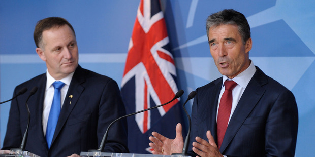John Key with Nato Secretary-General Anders Fogh Rasmussen at the signing of a partnership agreement in Brussels. Photo / NZ National Party