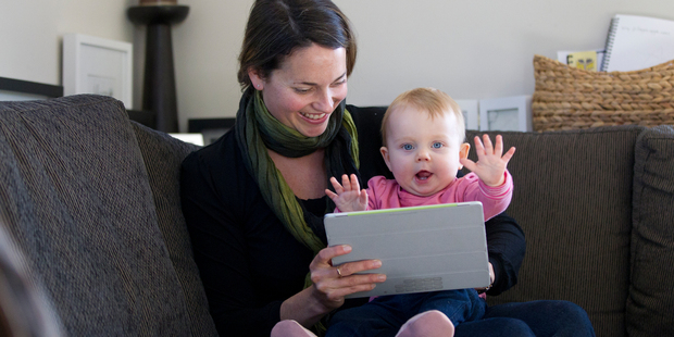 Aucklander Jo Chalkey gets social interaction and advice from other mothers about baby Emma's progress. Photo / Supplied