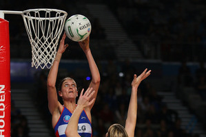 Anna Harrison of the Mystics put netball on the front pages after being hoisted repeatedly to block shots from the Melbourne Vixens during their match last month in Melbourne. Photo / Getty Images.