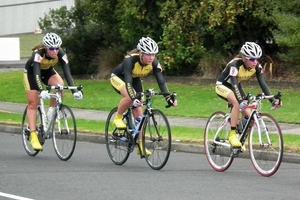 Massey High School cycling team, from left, Sammy Croft, Renee Wooton, Lydia Rippon and Laura Newman Watt hit the road in a time trial. Photo / Supplied