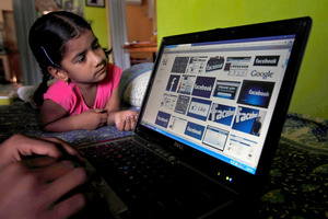 Facebook said that it is testing out ways to allow younger children to use the site. Photo /AP