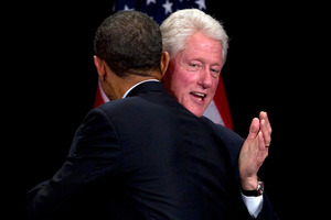 Bill Clinton greets Barack Obama at a campaign gala at the Waldorf Astoria hotel yesterday. Photo / AP