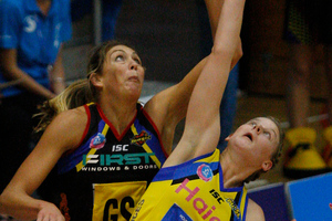 Magic shooter Irene van Dyk competing for the ball with Pulse defender Katrina Grant during last year's competition. File photo / Christine Cornege