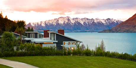 Matakauri Lodge's expansive windows bring that magnificent view of Lake Wakatipu and mountains seemingly indoors. Photo / Miz Watanabe