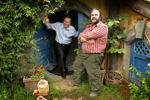 Sir Peter Jackson shows Prime Minister John Key around a 'hobbit house'. Photo / Alan Gibson