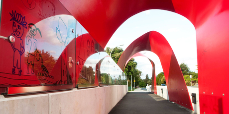 The Sturges Rd Bridge, Henderson, with artwork by Anthony Sumich (A Small House Fits a Hundred People You Love) and local children. Photo / Supplied