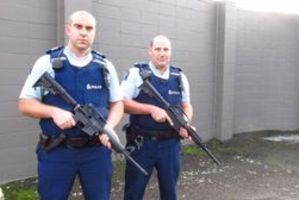 BB guns are being mistaken for real firearms. Sergeant Harry Harvey (left) has a police issue gun, while Constable Mike Hayward has a recently confiscated BB gun. Photo / Sonya Bateson