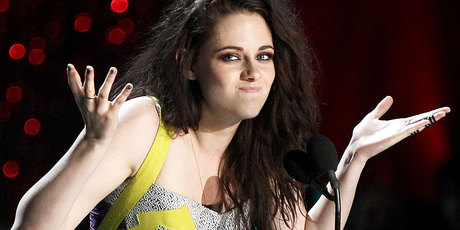 Kristen Stewart says she likes her trademark scowl.