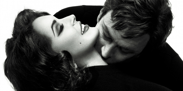 Grant Bowler kisses Lindsay Lohan in a promotional still for the film Liz & Dick. Photo / Lifetime/Supplied