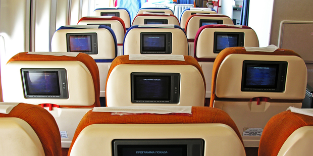 By ripping out TV screens on long-haul planes, Singapore-based Scoot, has cut 7% off the weight of their planes. Photo / Thinkstock
