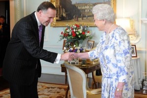 Britain's Queen Elizabeth II shakes hands with New Zealand's Prime Minister John Key at Buckingham Palace in London on June 6, 2012. Photo / AFP