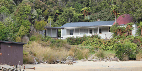 The former postmaster of Ulva Island’s house is on the far right. Photo / Jill Worrall