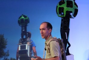 Luc Vincent, Google Engineering Director for Street View, demonstrates a backpack camera called Trekker. Photo / AFP