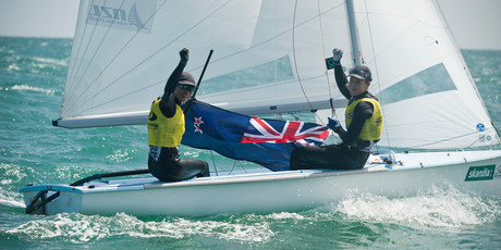 Jo Aleh and Olivia Powrie celebrate retaining their crown in the 470 event at Weymouth last week. Photo / Supplied.