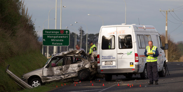 Police investigate the scene of a serious crash that left two people dead on State Highway Two near Mangatawhiri on Friday afternoon. Photo / Greg Bowker