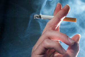 Smoking is widely stigmatised in our society but young people are still often surrounded with powerful reasons to start. Photo / Getty Images