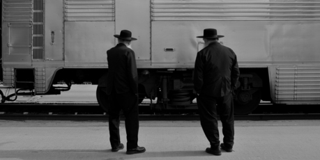 Two Amish men and a train at Albuquerque Station. Photo / Creative Commons image by Rob Sinclair