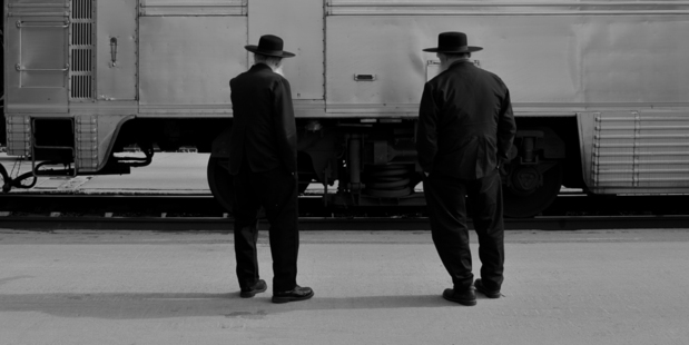 Two Amish men and a train at Albuquerque Station. Photo / Creative Commons image by Rob Sinclair