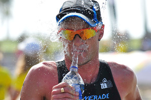 New Zealand's Kris Gemmell cools off with a blast of cold water during the 2012 ITU World Triathlon San Diego in the United States last month. Photo / AP