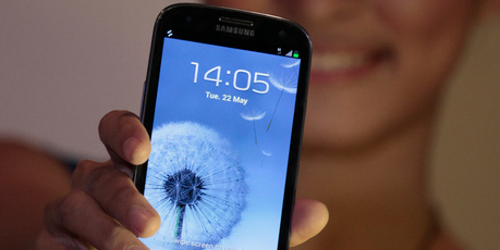 A model displays a Samsung Galaxy S III. Photo / AP