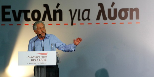 Financial markets are awaiting Greece's second general election this weekend. Democratic Left leader Fotis Kouvelis speaks to his supporters during an election rally in Athens yesterday. Photo / AP