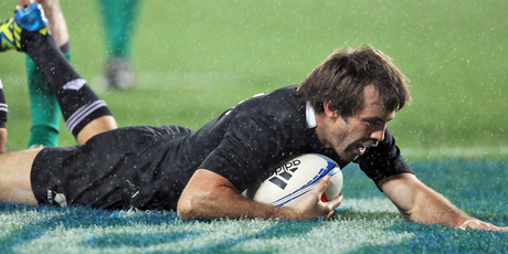 Conrad Smith dives over for his third career try against Ireland. Photo / Getty Images