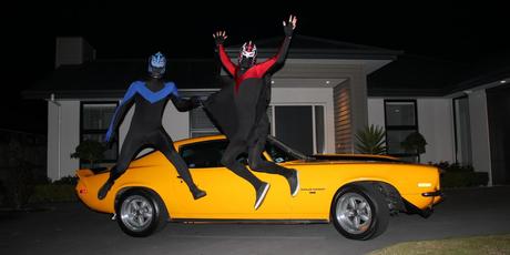 Flat Man and Quake Kid beside their Flatmobile - ready to do good for Christchurch's needy families. Photo / Facebook