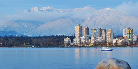 Vancouver's Grouse Mountain is seen in the background, beyond the city centre. Photo / Thinkstock