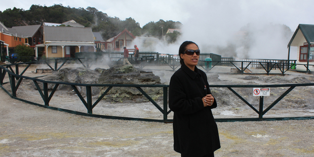A guide at Whakarewarewa introduces visitors to the steaming cauldrons that naturally cook food at temperatures of up to 250 degrees. Photo / Paul Rush