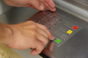 A care worker and her partner used a 99-year-old woman's bank card to fleece $37,500. File photo / Thinkstock