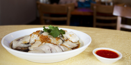 The Hainanese chicken was moist but the plain plating was unimaginative. Photo / Kellie Blizard