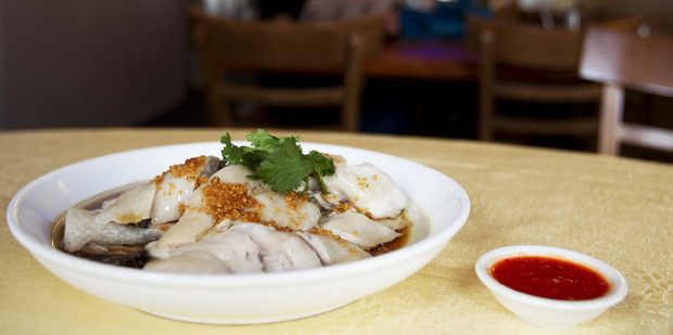 The Hainanese chicken was moist but the plain plating was unimaginative. Photo / Kellie Blizard