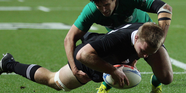 Sam Cane of the All Blacks dives over to score during the International Test Match between New Zealand and Ireland. Photo / Getty Images.