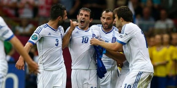 Greece's Giorgos Karagounis celebrates after scoring a goal. Photo / AP