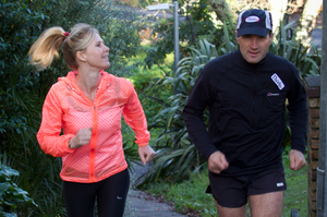 Rachel Grunwell mid-running lesson with coach, Russell Maylin. Photo / Kellie Blizard