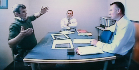 A photo from the videotaped police interview with Ewen Kerry Macdonald, left, played during his trial for the murder of Scott Guy, in the High Court at Wellington. Photo / Mark Mitchell