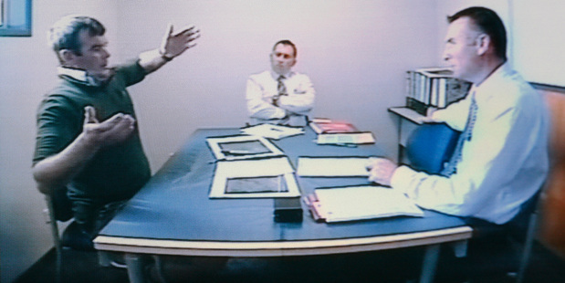 A photo from the videotaped police interview with Ewen Kerry Macdonald, left, played during his trial for the murder of Scott Guy, in the High Court at Wellington. Photo / Mark Mitchell