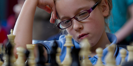 Tycee Malyon, 7, loves the excitement of taking other players' chess pieces in competition games. Photo / Sarah Ivey